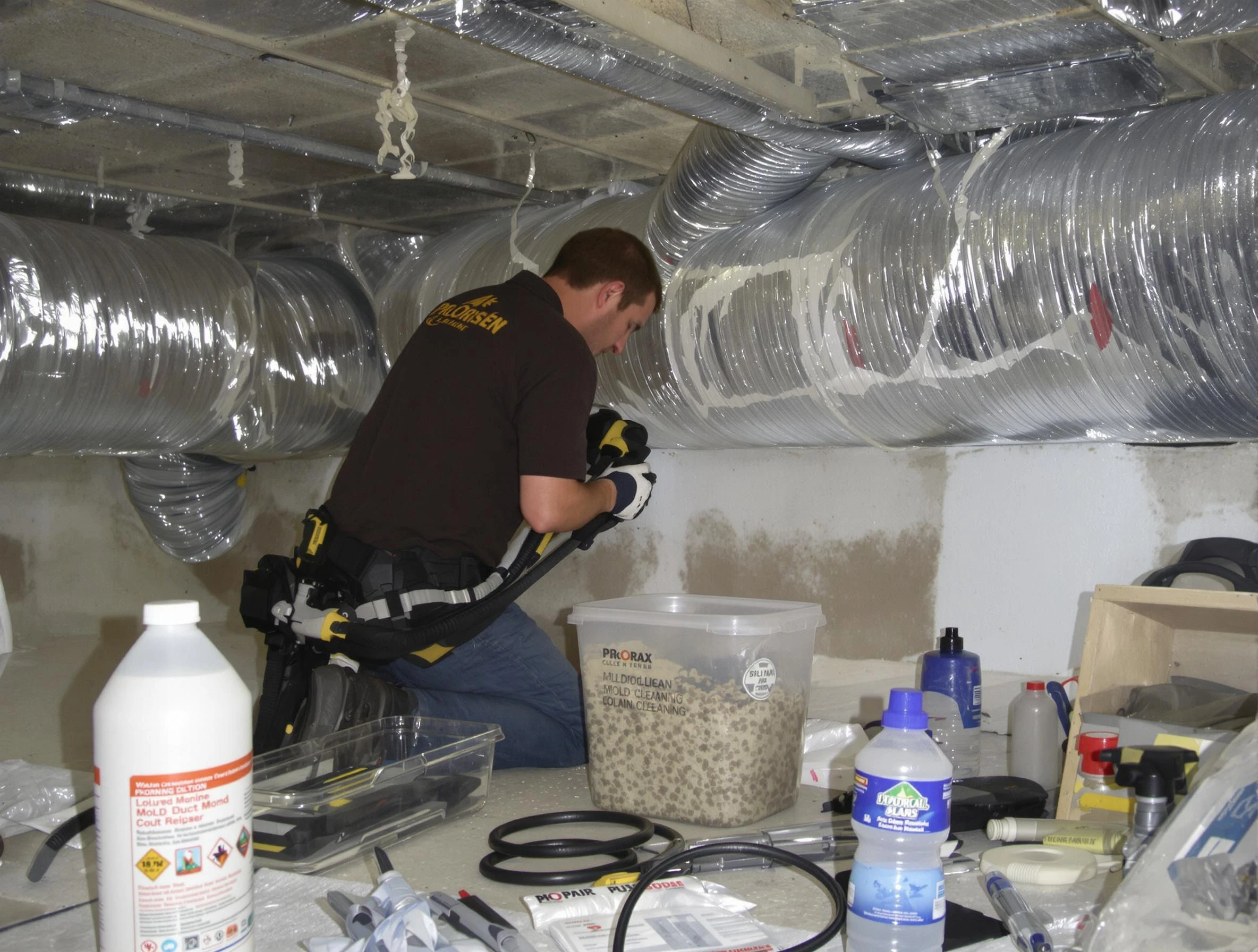 Pawtucket Air Duct Cleaning specialist performing professional mold removal from air ducts in Pawtucket